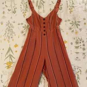 Backless cropped jumper with bow and buttons